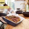 photo with Close Up Of Man Taking Vegetarian Nut Roast Out Of Oven For Christmas Dinner